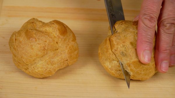 Make a diagonal cut in each choux pastry.