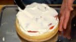 Drop the whipped cream on top and spread evenly. Add extra whipped cream to cover the strawberries completely.