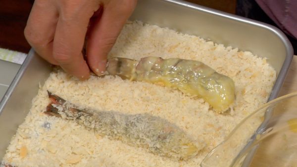 Finally, coat the prawns with moist breadcrumbs. If they appear patchy, dip them into the egg again and reapply the breadcrumbs.