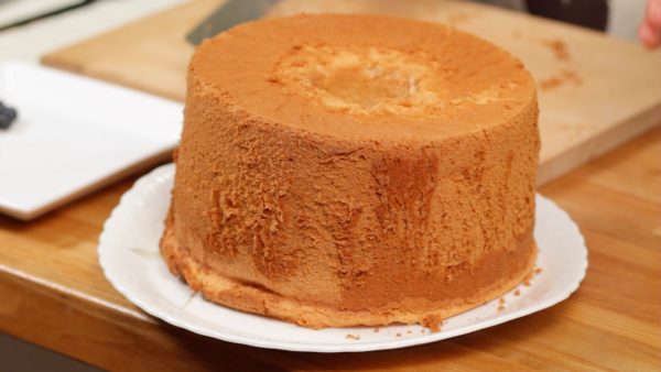 Place the whole chiffon cake onto a plate.