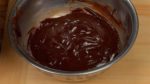 Remove the bowl from the bain-marie and allow it to sit to cool. When cooled, firm up the chocolate completely in the fridge or freezer.