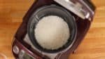 Place the sweet rice into the inner bowl of a rice cooker. Pour in the shrimp stock. Then, cook the rice in sweet rice mode on the rice cooker. If your rice cooker doesn't have a sweet rice mode, select the white rice mode instead.