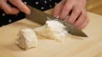 Remove the stem ends of the enoki mushrooms. Cut the enoki in half. Shiitake or maitake mushrooms can be also used for this recipe.
