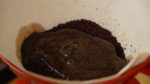 Place the coffee into the filter in the dripper. Even out the grounds making a flat surface. The water should be about 90°C (194°F). Slowly pour just enough water in the dripper to moisten the grounds. Let it sit for 30 seconds.