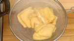 Turn off the burner and remove the drop-lid with tongs. Remove the fried tofu from the pot. Cool them down on a mesh strainer.