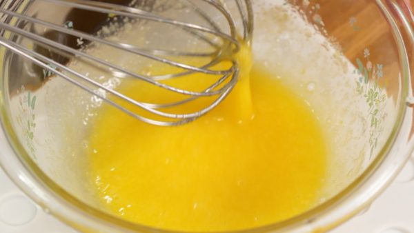 Add the grated lemon zest and honey. Make sure not to use zest with any waxy or chemical coating. Combine the egg mixture well.