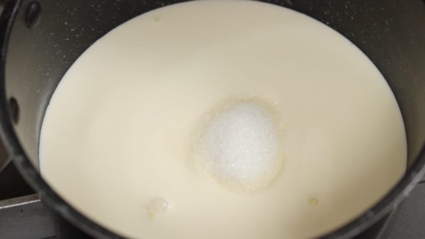 Combine the milk and heavy cream in a pot. Add the sugar.