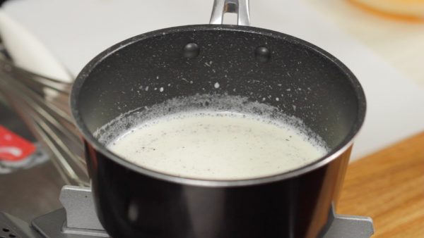 Heat the pot and occasionally stir the cream mixture. When small bubbles begin to form around the edges of the pot, remove.