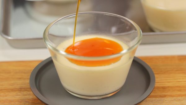 Now, the pudding and caramel sauce are fully chilled. Pour the caramel sauce on top without unmolding and enjoy the scrumptious custard pudding.