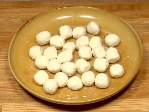 We’ll shape the dough into 27 dango pieces. Divide it into three equal pieces. Then, divide each dough piece into three again, and then split each into 3 smaller pieces. Shape them into balls and you should end up with 27 pieces in total.
