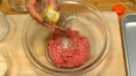 Season the meat mixture with salt, pepper and nutmeg. Knead the meat mixture in a bowl until a bit gooey.