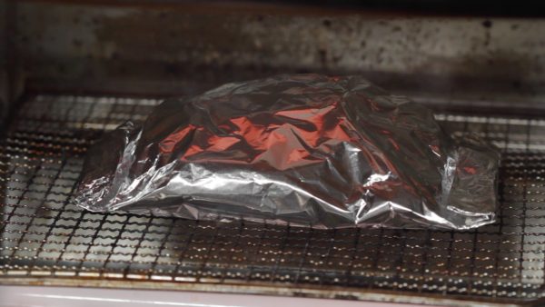 Then, place the foil into a toaster oven. Bake the salmon for about 20 minutes.