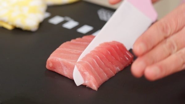 This is fresh tuna belly also known as chutoro. Slice it across the grain to give it a better texture. Chutoro has a moderate amount of fat and will deliciously melt in your mouth.