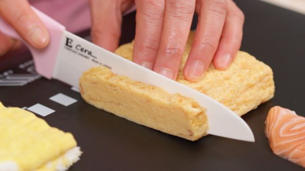 This is tamagoyaki, Japanese sweet omelette. Cut off a 5mm (0.2”) slice of tamagoyaki.