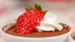 Squeeze out the whipped cream and garnish with the strawberry. And now, it is ready to serve!