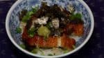 For the second bowl, season with the chopped spring onions, crumbled toasted nori and wasabi paste.