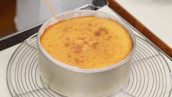Pierce the cake with a bamboo stick. If the stick is clean, it is ready. Let it sit to cool and then thoroughly chill the cake in the fridge.