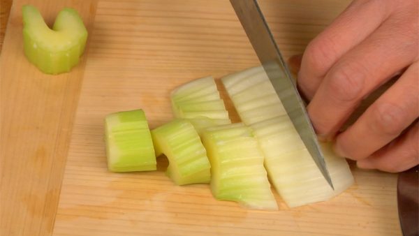 Remove the firm stringy parts of the celery. And then cut into bite-size pieces.