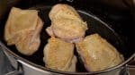 When they are lightly browned, flip them over. Lightly cook the other side, remove the chicken and reserve them on a plate.