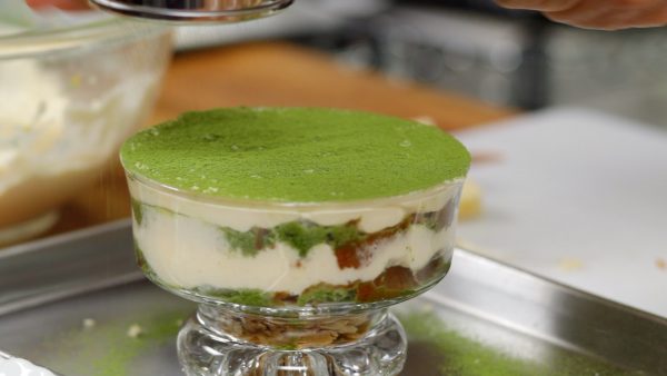Finally, sprinkle on the matcha green tea powder. This elegant dessert really makes the green color of the matcha stand out.