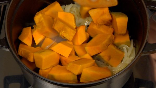 Drop in the pumpkin blocks and continue to sauté for 2 to 3 minutes.