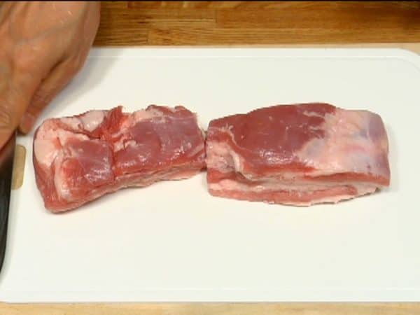 Let’s prepare the yakibuta, roasted pork belly. Cut the pork belly in half.