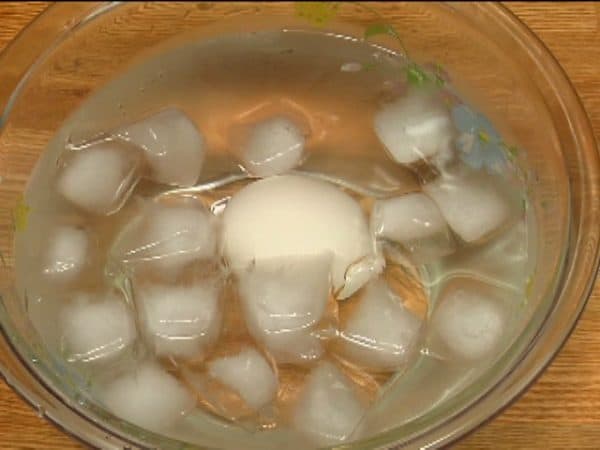 Boil for 4 minutes and cool the eggs in a bowl of ice water.