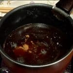 Reheat the pork broth in a pot. Add the brown sugar, dissolving it completely.