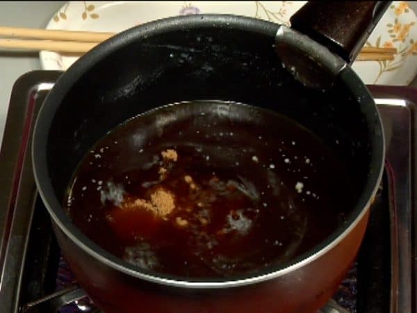 Reheat the pork broth in a pot. Add the brown sugar, dissolving it completely.