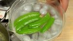 Remove, and let the snap peas cool in icy water.