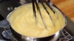 The pastry cream begins to turn glossy, and the consistency becomes slightly weak. At this stage, keep mixing for 1 to 2 more minutes.