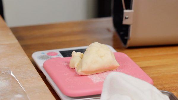 Using a kitchen scale, adjust the weight to about 47g (1.65 oz) per piece.