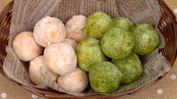 Place the matcha donuts beside the regular donuts.