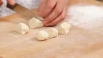 Roll out the rest of the dough again. Cut it into 6 equal pieces.