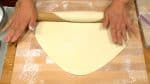 Rotate the dough sheet by 90 degrees and repeat the process.