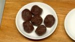 Split the premade anko in half. Get 3 pieces from each half and shape them into balls. You will have 6 anko balls in total.