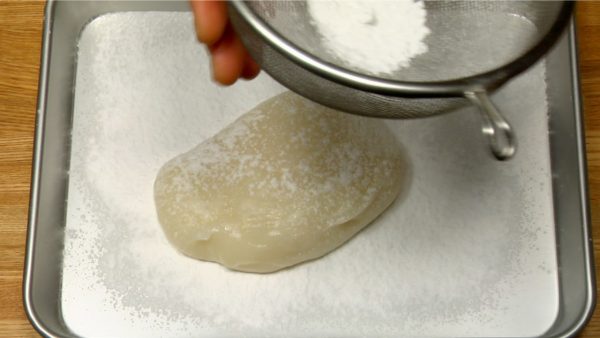 Dust the mochi with potato starch.