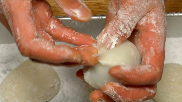 Reapply potato starch frequently to your hands since mochi is extremely sticky.