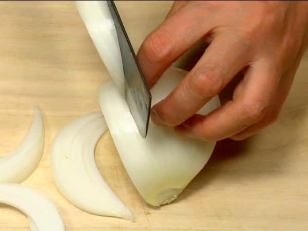 Slice the onion into 1cm (0.4") wedges.