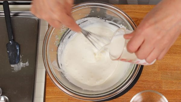 Now, add the heavy cream a little at a time while stirring.