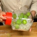 Rotate the container and mix the ume, rock sugar and vinegar well. For the first day, rotate the container frequently to dampen the ume with the liquid.