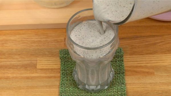 Remove the glass pitcher from the blender and pour the smoothie into a glass.