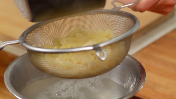 Now, drain the macaroni with a mesh strainer.