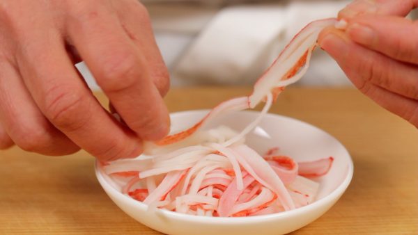 Tear them into thin strips. Crab sticks are inexpensive so they are often used in salad, fried rice or Tenshinhan, crab meat omelet on top of rice.