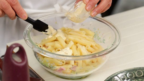 Add the mayonnaise to the macaroni.