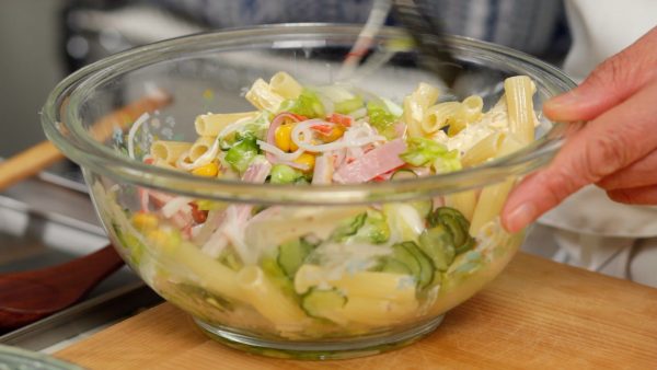 Gently toss the salad to coat. Coating the macaroni with olive oil beforehand will also help it avoid getting soggy.