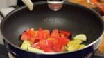 Then, add the diced tomato.