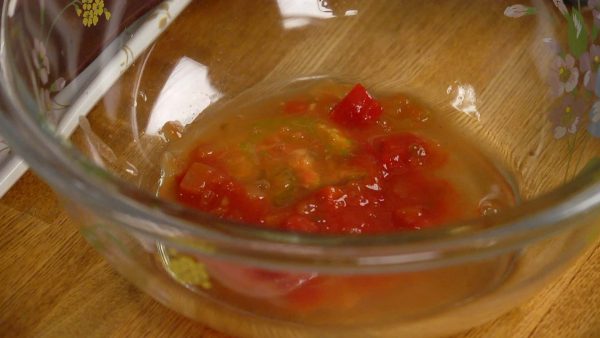 Now, let’s make the Taco Rice. First, combine the tomato-based salsa, lemon juice, tomato seeds.