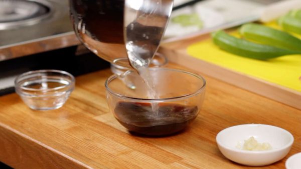 Then, combine the mixture and the soy sauce in a bowl. Stir and slightly cool the sauce.