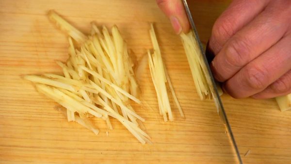 Slice and shred the ginger root.